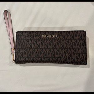 Brown and powder blush Michael Kors zipper wallet